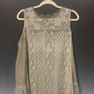 Romantic lace and sheer fabric sleeveless top
